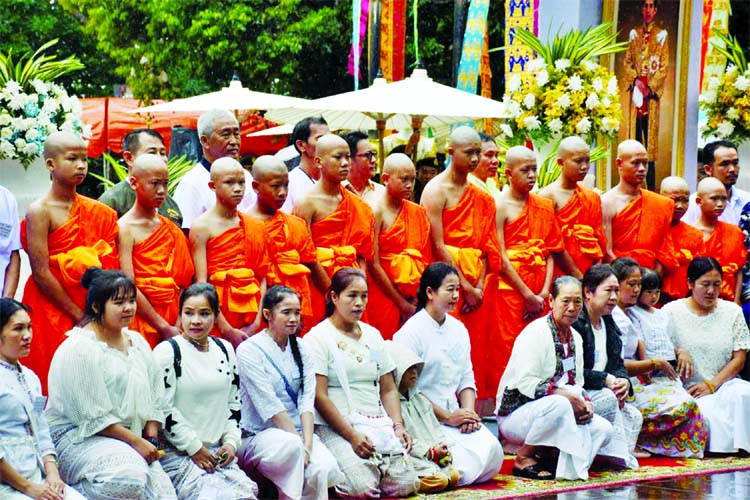 Members of the soccer team rescued from a cave attend a Buddhist ordination ceremony at a temple at Mae Sai, in the northern province of Chiang Rai, Thailand.