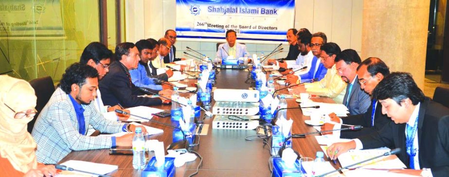 Akkas Uddin Mollah, Chairman of the Board of Directors of Shahjalal Islami Bank Limited, presiding over its 266th meeting at its head office in the city recently. Farman R Chowdhury, Managing Director, Mohammed Golam Quddus and Khandaker Shakib Ahmed, Vi