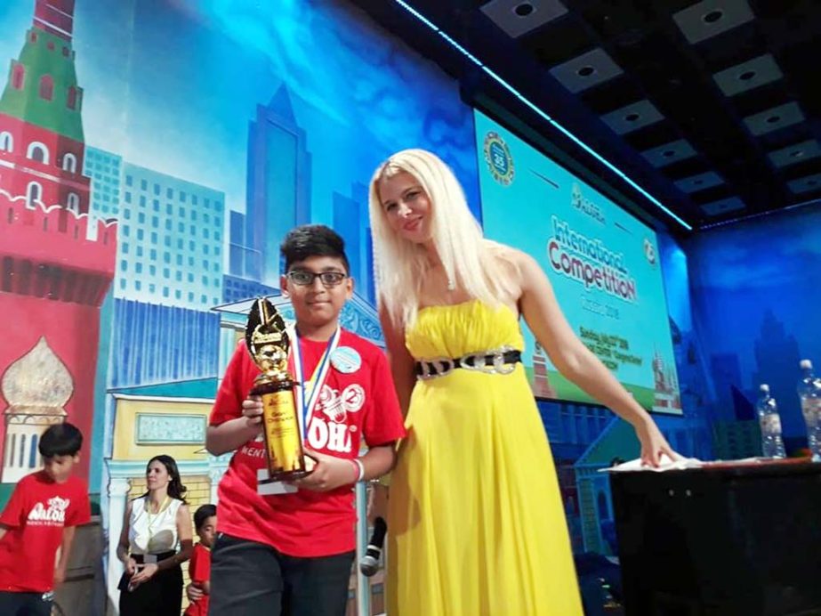Sharif Adibur Rahman is seen with champion trophy at the Aloha Mental Arithmetic International Competition-2018 held at the World Trade Center in Moscow, Russia on Sunday.