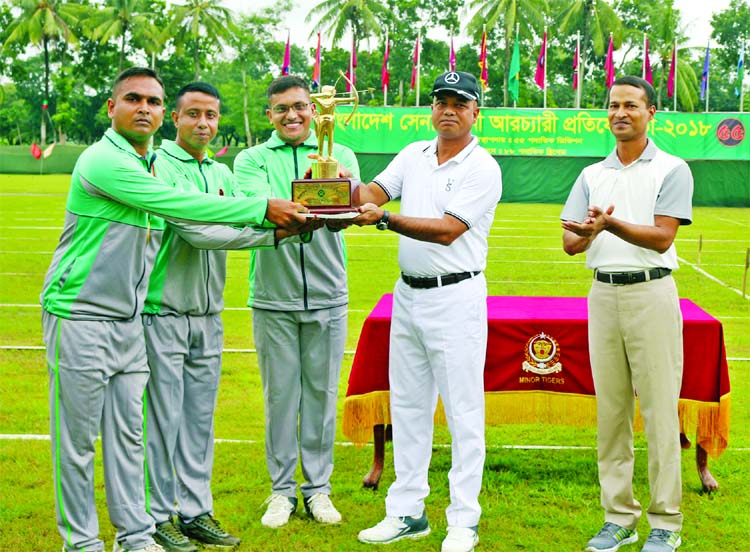 Brigade Commander of 105 Infantry Division Brigadier General SM Salahuddin Islam handing over the championship trophy to 66 Infantry Division, which emerged as the champions of the Bangladesh Army Archery Competition at the Osmani Stadium in Jashore Canto