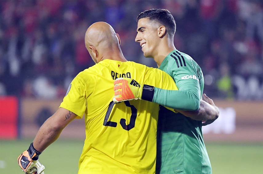 Manchester United goalkeeper Joel Pereira (right) is congratulated by AC Milan goalkeeper Pepe Reina after Manchester United won a penalty shootout in an International Champions Cup tournament soccer match on Wednesday in Carson, Calif. Manchester United
