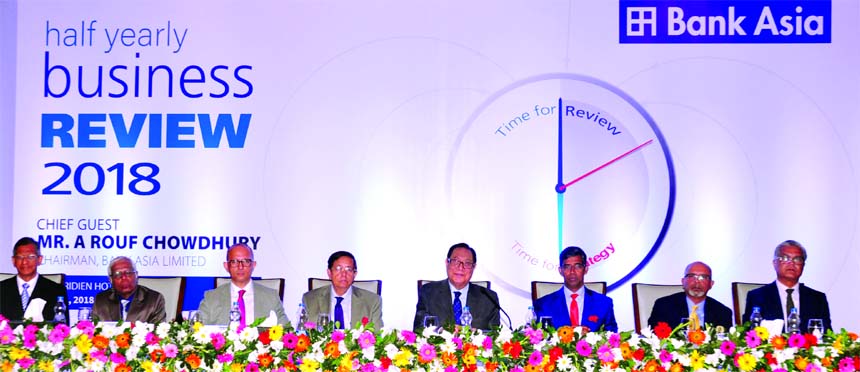 A. Rouf Chowdhury, Chairman of Bank Asia, presiding over the Half Yearly Business Review 2018 of the Bank at a hotel in the capital on Saturday. Mohd. Safwan Choudhury, Vice Chairman, Rumee A. Hossain, Chairman of Board Executive Committee, M. Irfan Sye