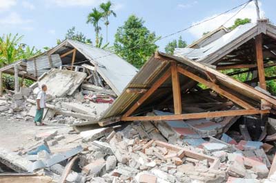 The collapsed ruins of a house following a 6.4-magnitude earthquake on the Indonesian island of Lombok.