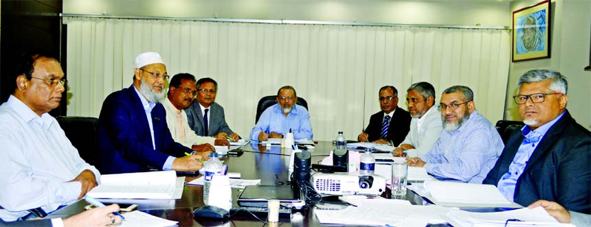 Shibbir Mahmud, Chairman of the Board of Directors of Islamic Finance and Investment Limited, presiding over its 238th meeting at its head office in the city on Saturday. A Z M Saleh, Managing Director, Rezakul Haider, Anis Salahuddin Ahmad, Vice-Chairmen