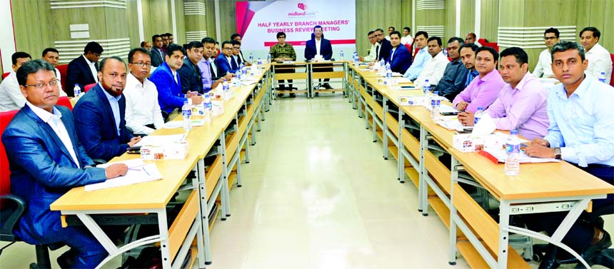 Md. Ahsan-uz Zaman, Managing Director of Midland Bank Limited, Mohammad Masoom, Additional Managing Director of the Bank, are seen at the Half Yearly Branch Managers' Business Review Meeting 2018 at the Bank's head office on Friday. Head of the Branches