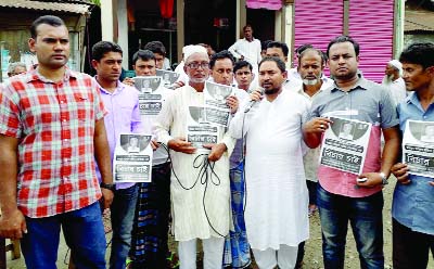 TRISHAL(Mymensingh): A B M Anisuzzaman, Mayor, Trishal Pourashava speaking at a protest rally demanding exemplary punishment to the killers of freedom fighter Abdul Matin Master at Mothbari Union yesterday.