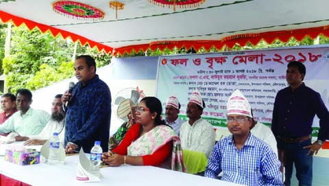 MANIKGANJ: A M Naimur Rahman Durjoy MP speaking at the inaugural programme of three day-long Fruit Tree Fair organised by Daulatpur Upazila Administration and Agriculture Extension Directorate as Chief Guest on Monday. Among others, Kaniz Fatima, UNO an