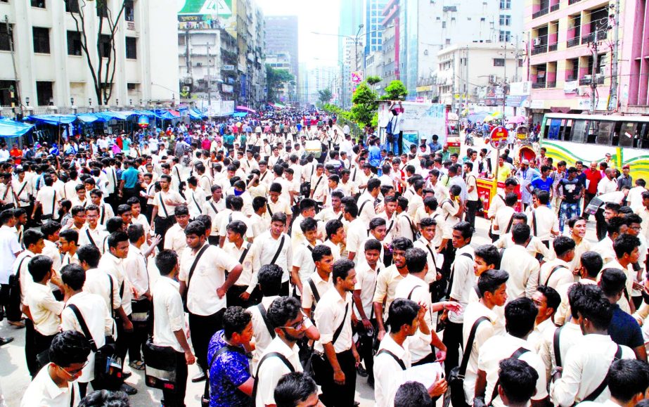 Students of different schools and colleges blocked the city's Motijheel-Dainik Bangla crossing and following the Sunday's bus accident near Hotel Radisson Blu on Tuesday.