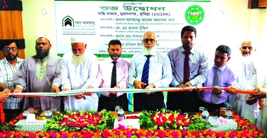 Abed Ahmed Khan, Executive Vice President and Head of Agent Banking Division of Al-Arafah Islami Bank Limited, inaugurating its 154th Agent Outlet at Panti Bazar in Muradnagar of Cumilla recently. Assistant Vice President and Manager of Gouripur branch of