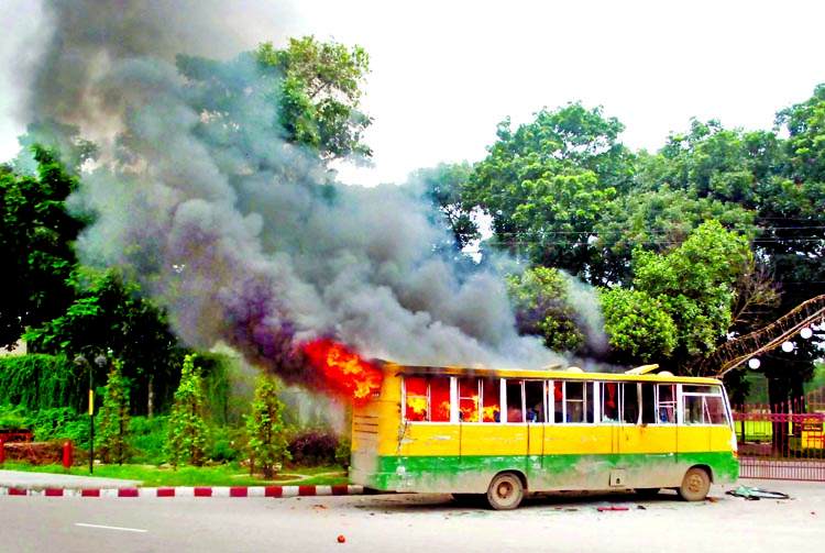 A bus was set on fire in front of Army Golf Club in Khilkhet area.