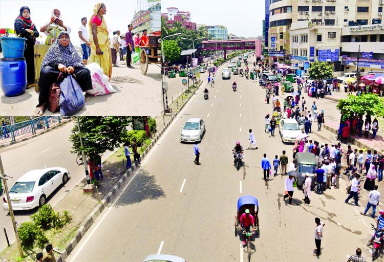 City buses remained off the roads for the 6th consecutive day on Friday following the continuous students demonstrations demanding for safe roads. This photo was taken from Bangla Motor area on Friday and (inset) home-bound passengers are seen waiting in