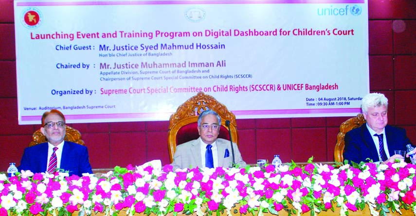 Chief Justice Syed Mahmud Hossain, along with other distinguished persons at the launching event and training programme on 'Digital Dashboard for Children's Court' organised jointly by Supreme Court Special Committee on Child Rights and UNICEF Banglad