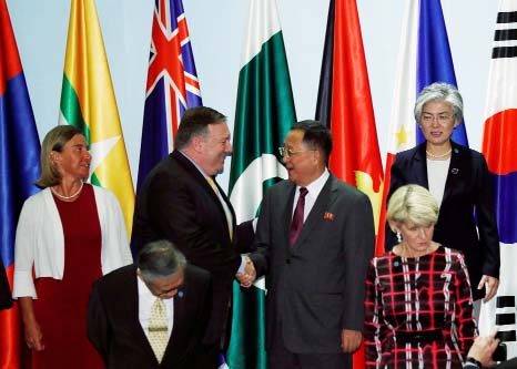 US Secretary of State Mike Pompeo shakes hands with North Korea's Foreign Minister Ri Yong Ho at the Asean Regional Forum in Singapore on Saturday.