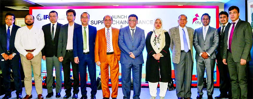 Sohail R K Hussain, Managing Director of City Bank Limited, poses with the participants of the launching ceremony of 'Supply Chain Finance and Distributor Finance Facility' at the Bank's head office in the city on Sunday. Syed Alamgir, Managing Directo