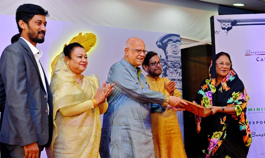 Professor Masuda M Rashid Chowdhury, a women entrepreneur of the country, receiving the "Golden Pen Business Award' for her business and industrial excellent for the last 50 years and also for her contributions towards creation of more than 15,000 women