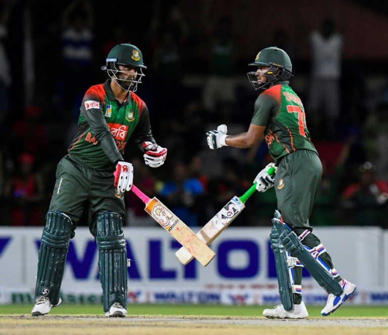 Tamim Iqbal (L) and Shakib al Hasan (R) powers Bangladesh to a competitive 171 for five batting first against the West Indies in the second fixture of a three-match T20 International series at Lauderhill in Florida, USA on Sunday.