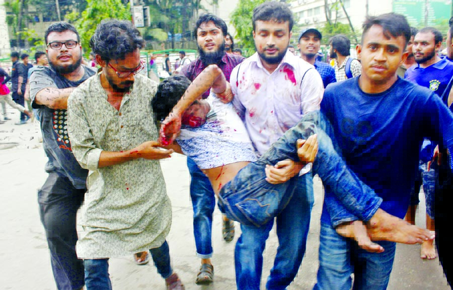 An agitating student was seriously injured while an armed group of ruling party men chase them near Science Laboratory in city on Sunday.