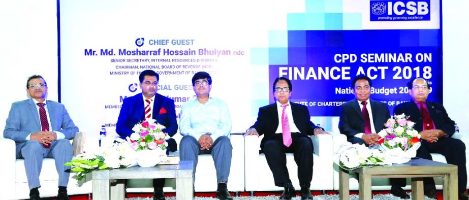 NBR Chairman Md. Mosharraf Hossain Bhuiyan, attends the seminar on "Finance Act, 2018 vis-Ã -vis National Budget 2018-19" organized by ICSB at the Dhaka Club on Saturday as chief guest. Kanon Kumar Roy, Member (Tax Policy) of NBR, Sadhan Chandra Das,