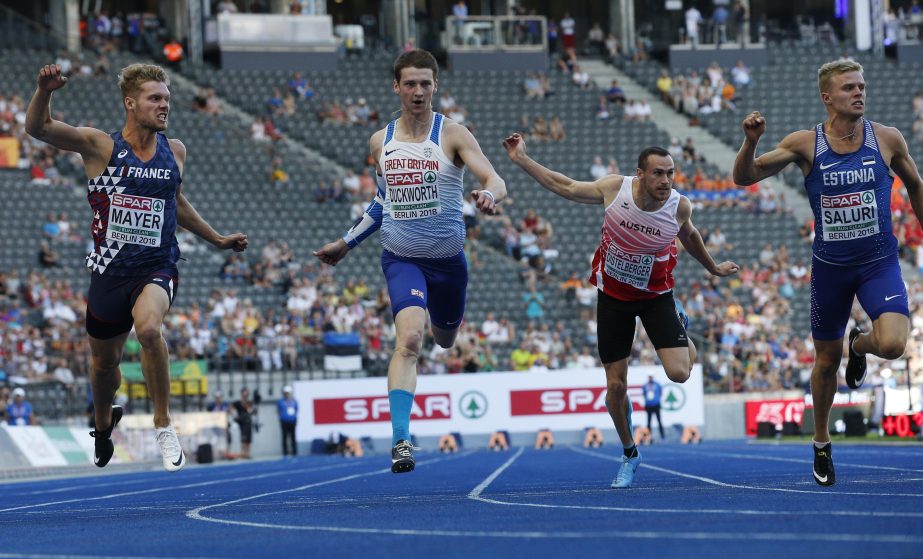 France's Kevin Mayer, Britain's Tim Duckworth, Austria's Dominik Distelberger and Estonia's Karl Robert Saluri, from left, cross the line of the 100-meter event of the decathlon at the European Athletics Championships in Berlin, Germany on Tuesday.