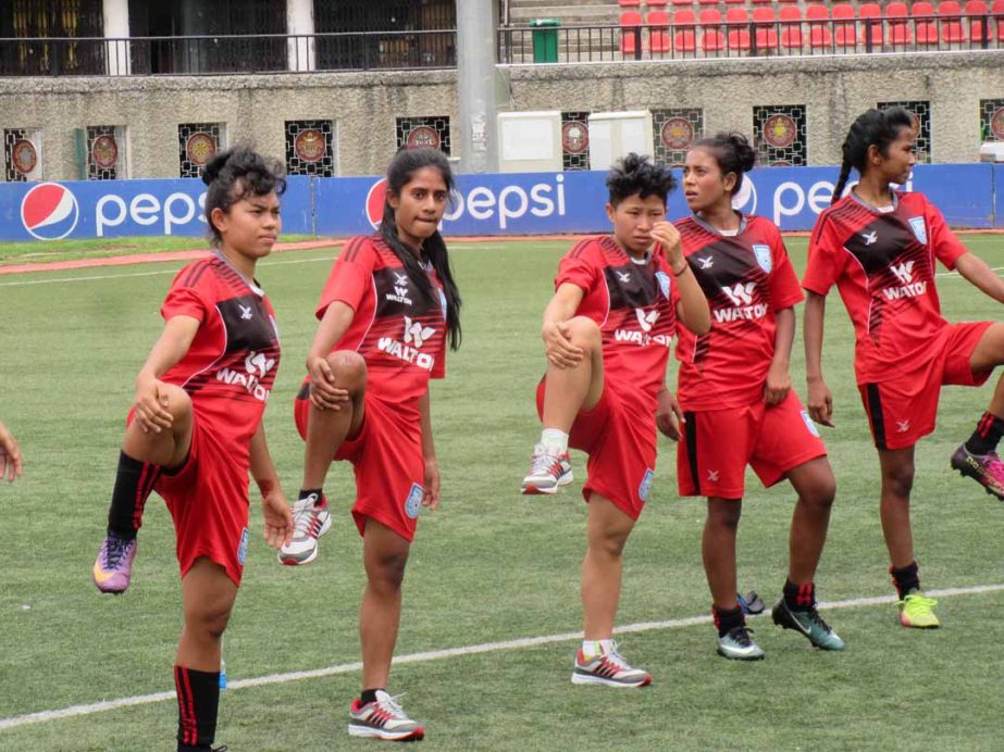 Players of Bangladesh Under-15 National Women's Football team during their practice session at Thimphu, the capital city of Bhutan on Tuesday.