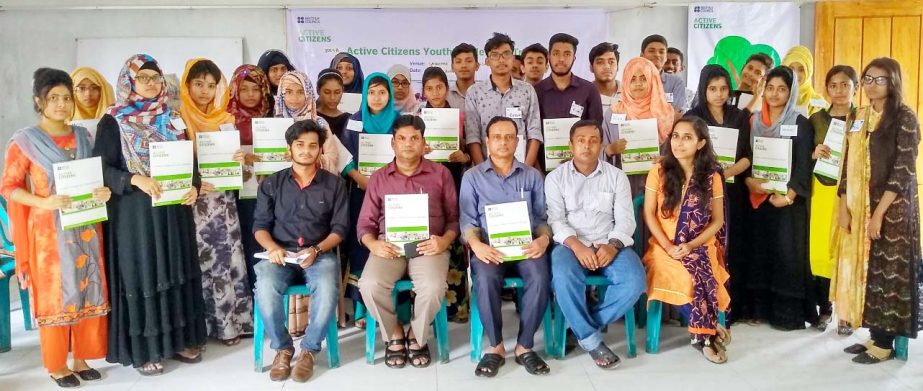 Harun-or-Rashid, Principal of Sanarpar Rowshan Ara Degree College is seen at a photo shoot at the inauguration ceremony of a youth training workshop organized by the Hunger Project Bangladesh in cooperation with the British Council, Bangladesh at the coll