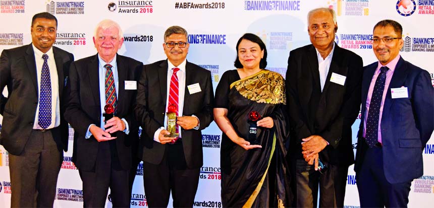 MM Monirul Alam, CEO, David James Howard Griffiths, Director, Barrister Nihad Kabir, Sponsor of Guardian Life Insurance pose for a photo with the Insurance Asia Awards at the Shangri-La Hotel in Singapore recently. Gokul Chand Das, Member and Khalil Ahme
