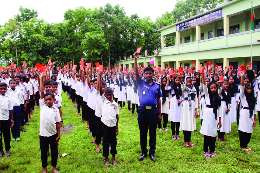 KULAURA (Moulvibazar): Md Abu Yusuf, Additional Police Super, Kulaura Circle operating an oath taking ceremony against drug abuses and early marriage at Nobin Chandra Govt High School premises organised by Lal Sobuj Unnoyan Sangho recently.