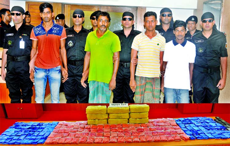 Four drug traders were arrested with two lakh six thousand pieces of yaba from their possession. The photo was taken from RAB media centre on Wednesday.