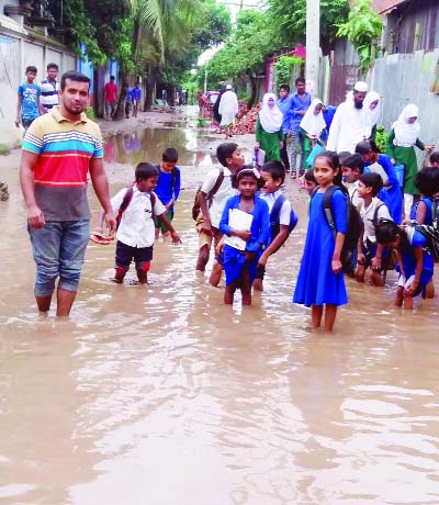 MURADNAGAR (Cumilla): The dilapidated Sreekail- Titas Road needs immediate reconstruction as the road has been water- logged for a long time. This snap was taken yesterday.