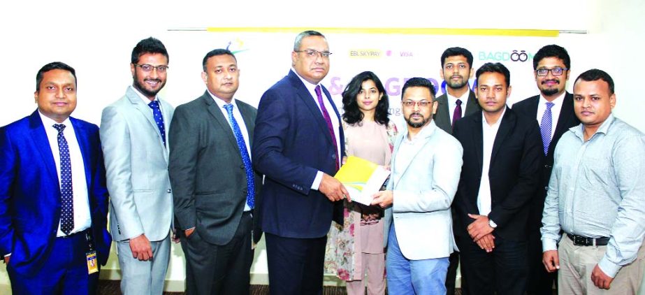 M. Khorshed Anowar, Head of Retail Banking of Eastern Bank Ltd (EBL) and Mirajul Huq, CEO of Bagdoom (a e-commerce site), exchanging an agreement signing document at the Bank's Gulshan office on Tuesday. Under the deal, customers of Bagdoom, will be able