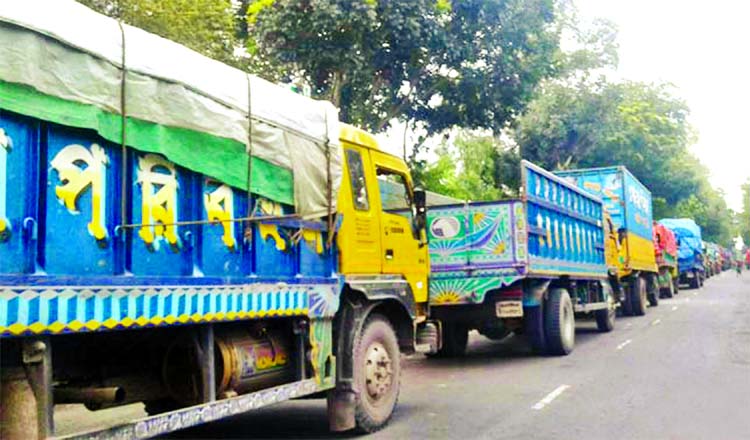 At least three hundred goods-laden truck remained stranded on Daulatdia- Paturia road as ferries being disrupted and are unable to anchor at ferry ghat due to heavy current. This photo was taken from Paturia area on Friday.