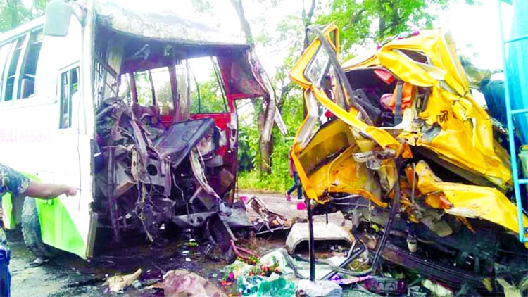 A man was killed and 12 others injured following a head-on collision between a Shyamoli Paribahan bus and a covered van on Bonpara-Hatikumrul road in front of Hansmara Mofizuddin Model School at Gurudaspur upazila in Natore on Monday.