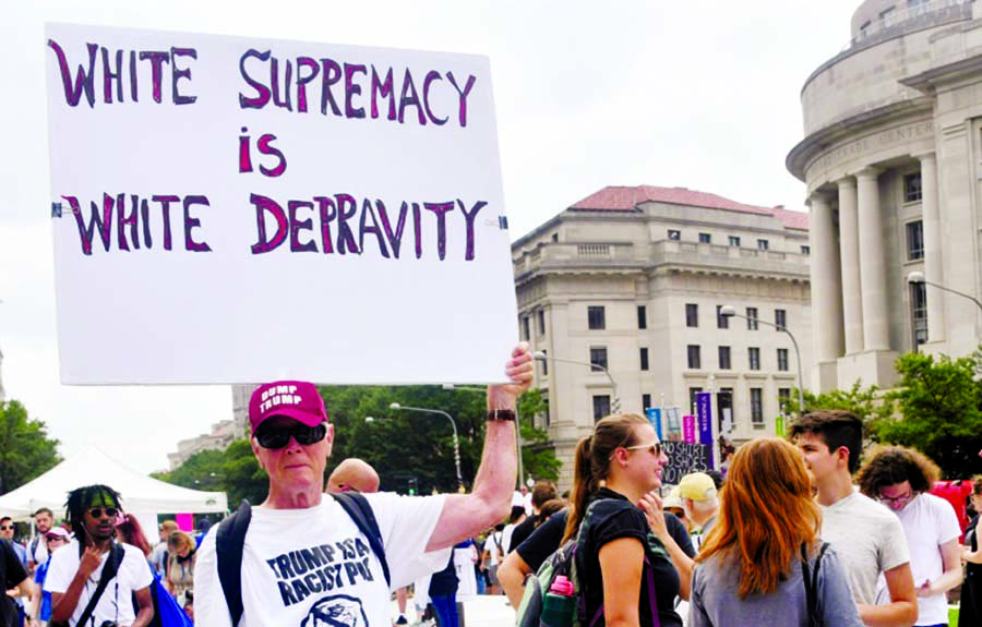 Counter-protesters gather in Washington ahead of the Unite The Right rally.