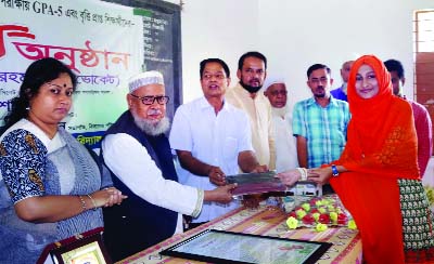 SYLHET: Adv Md Lutfur Rahman, Chairman, Sylhet Zilla Parishad distributing prizes among the meritorious students of JSC and SSC as Chief Guest organised by South Surma Adarsha High School on Monday.