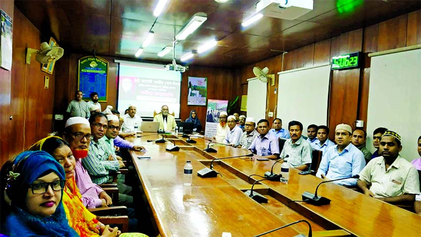 Mohammad Jalaluddin, Managing Director of Ansar-VDP Unnayan Bank, presiding over a discussion meeting on "National Mourning Day" at its head office on Tuesday. Officers and employees of the Bank were present.