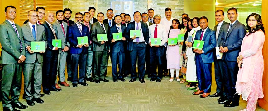 Mohammed Zahirul Alam, Deputy Managing Director of Bank Asia and Aniruddha Hom Roy, Private Sector Advisor, Economic Growth Office of USAID take part at the launching ceremony of `Agent Nirdeshika', a publication by Bank Asia in its Corporate Office in t