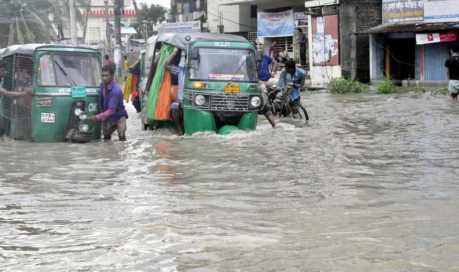 Some of the areas of Port City have been water- logged due to tidal water. This snap was taken from Halisahar yesterday.