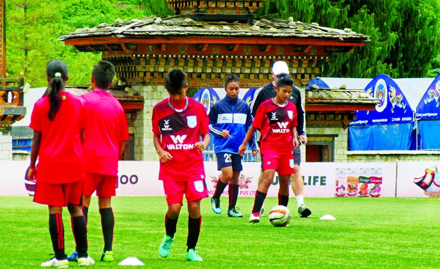 Members of Bangladesh Under-15 National Women's Football team during their practice session at Thimphu, the capital city of Bhutan on Tuesday.