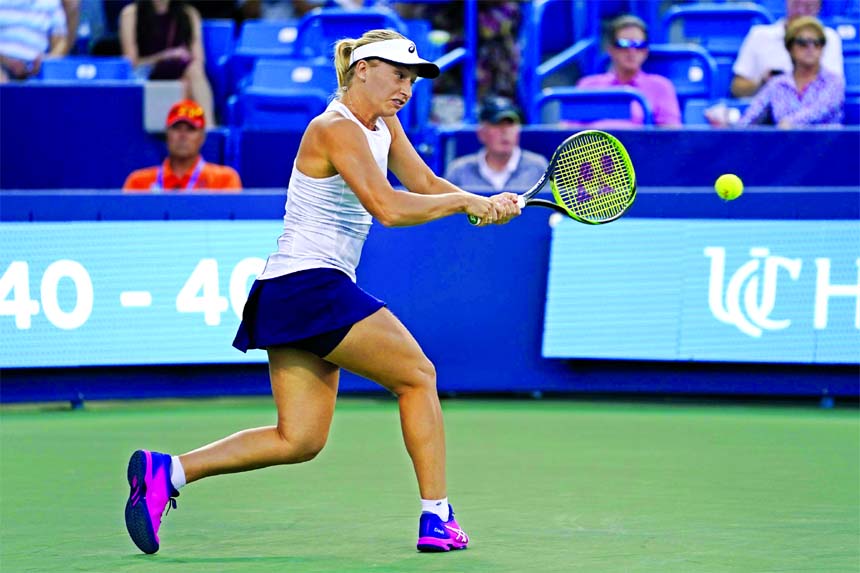 Daria Gavrilova of Australia, returns to Serena Williams in the first round at the Western & Southern tennis Open in Mason, Ohio on Monday .