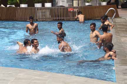 Members of Bangladesh Under-23 National Football team during their practice session at the swimming pool in Jakarta, the capital city of Indonesia on Wednesday.