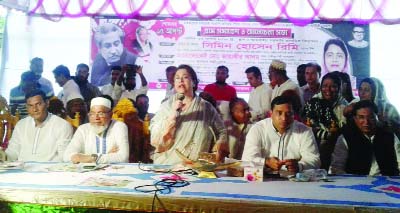 KAPASIA(Gazipur): Simin Hossain Rimi MP speaking at a village gathering on the occasion of the National Mourning Day as Chief Guest on Wednesday.