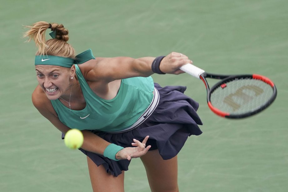 Petra Kvitova of the Czech Republic, serves to Elise Mertens of Belgium, at the Western & Southern Open tennis tournament on Friday in Mason, Ohio.