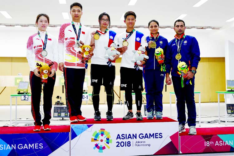 From left to right, silver medalists China's Zhao Ruozhu, Yang Haoran, gold medalists Taiwan's Lin Yingshin, Lu Shaochuanm and bronze medalists India's Apurvi Chandela, Ravi Kumar celebrate with their medals during ceremonies for the 10m air rifle mixe