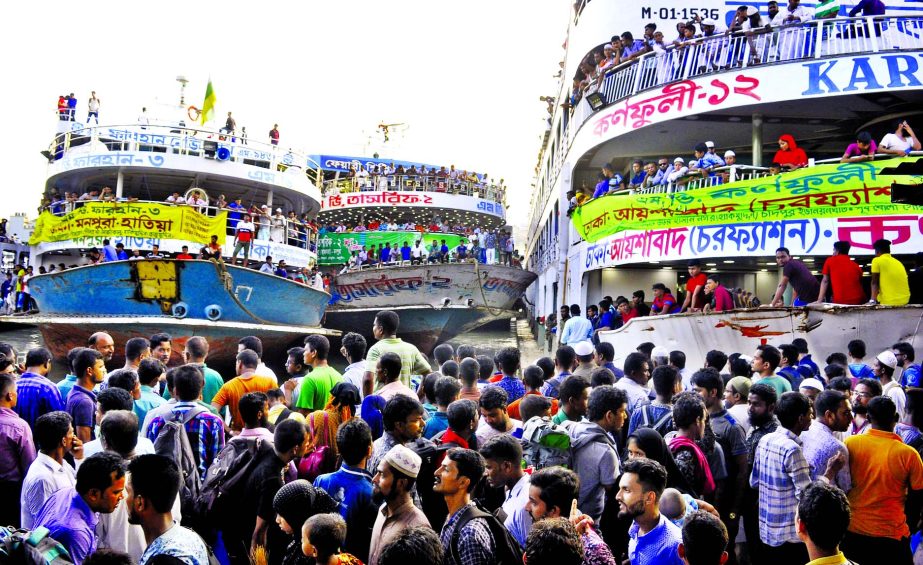 Sadarghat Launch Terminal being overcrowded by the home goers to celebrate Eid-ul-Azha with their near and dear ones. Photo shows launches are packed with passengers on Sunday.