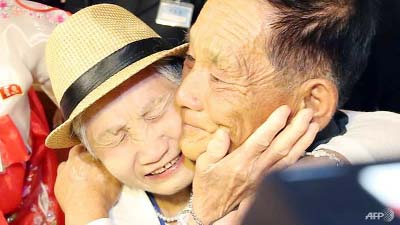 South Korean Lee Keum-seom (L), 92, meets with her North Korean son Ri Sung Chol (R), 71, during a separated family reunion meeting at the Mount Kumgang resort on the North's southeastern coast on Monday.