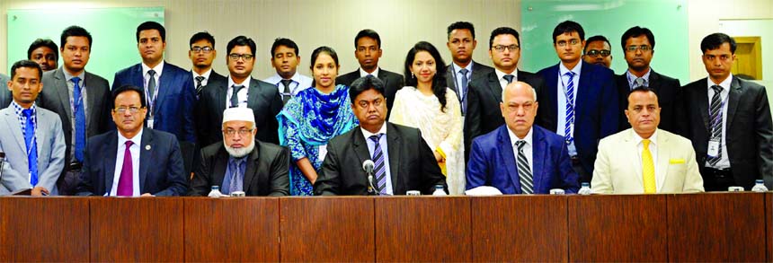 Mosleh Uddin Ahmed, Managing Director of NCC Bank Limited, poses with the participants of the 72nd Foundation Training Course for its officers at the Bank's Training Institute in the city recently. Khondoker Nayeemul Kabir, Md. Habibur Rahman, DMDs, J H