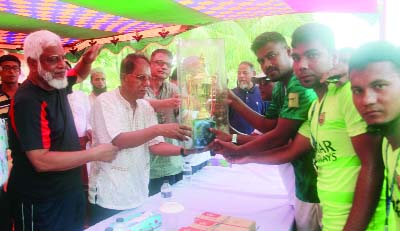 MODHUKHALI(Faridpur): Prizes are being distributed among the winners at Razaya Karim Golden Cup Football Tournament at Modhukhali recently.