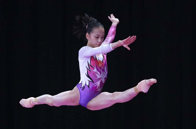 China's Zhang Jin performs on the balance beam during the women's apparatus gymnastics final competition at the 18th Asian Games in Jakarta, Indonesia on Friday.