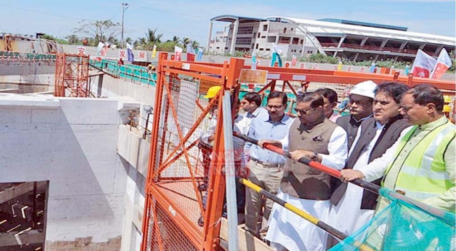 Minister for Road Transports and Bridges Obaidul Quader along with party leaders inspecting the construction sites of Karnaphuli tunnel at Patenga yesterday.