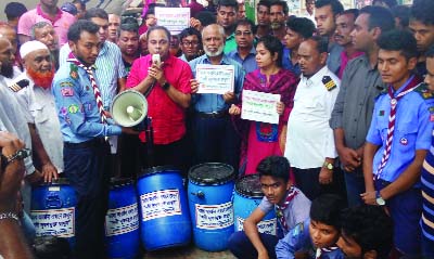 PATUAKHALI: Dr Md Masumur Rahman, DC, Patuakhali distributing dustbins among the launch owners on Saturday.